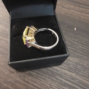 Elegant Silver Ring with Yellow and Purple Accents